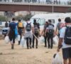 Grupo de voluntarios participando en las ayudas para los afectados por la DANA